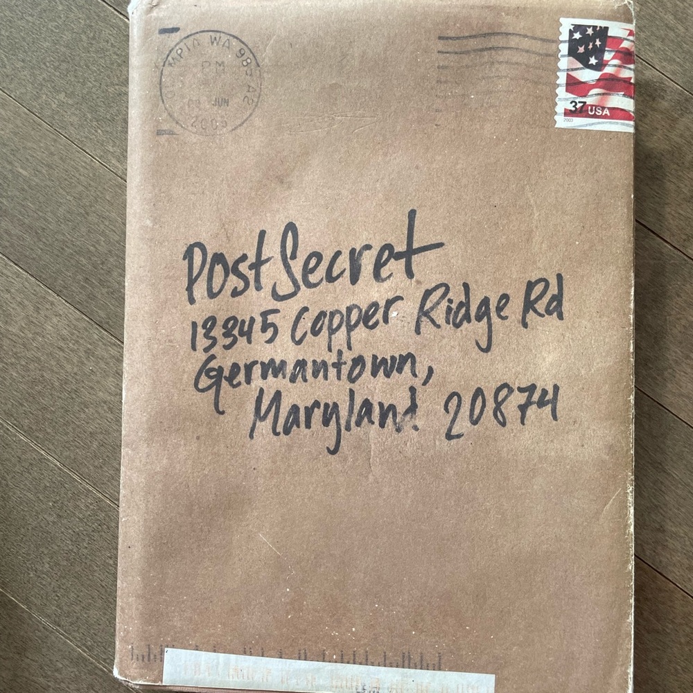 2 hardcover Post Secrets books